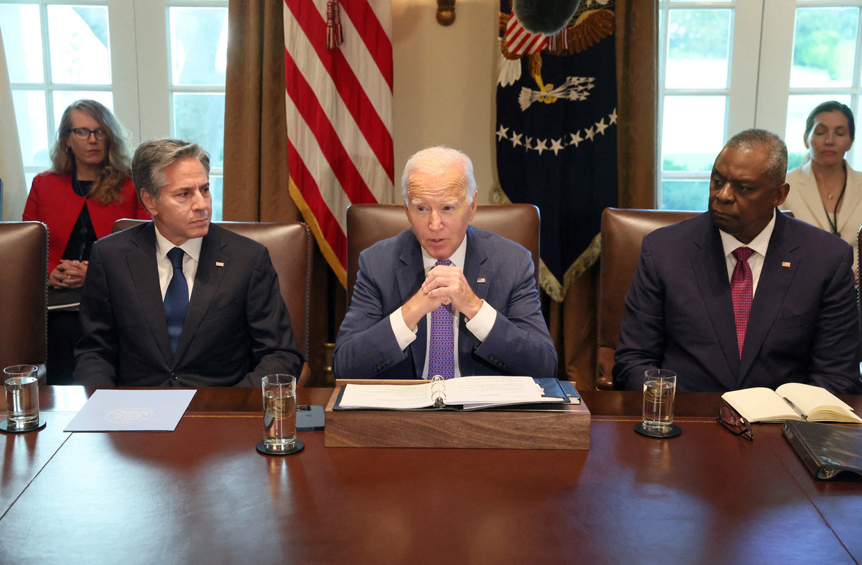 Secretary Lloyd Austin (R.) with Secretary of State Anthony Blinken (L.) and President Joe Biden during a cabinet meeting at the White House last October.  Image courtesy REUTERS